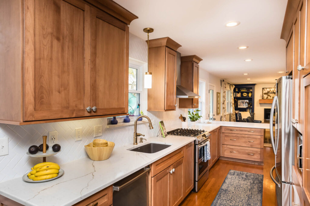 Columbus kitchen remodel with brown cabinetry and quartz countertop