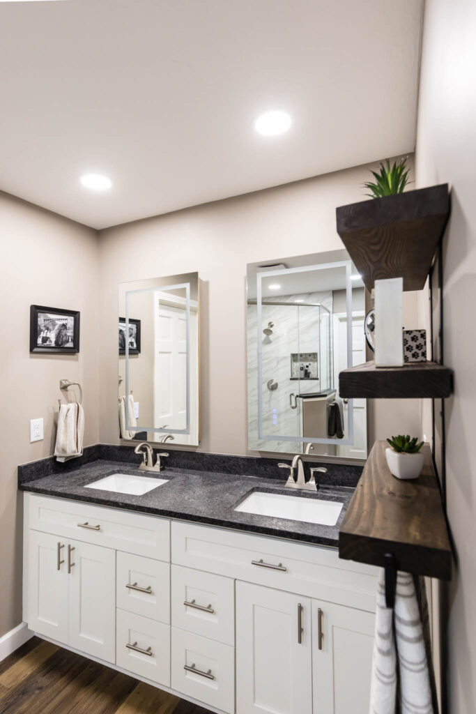 Lewis Center bathroom remodel with double white sink vanity and silver hardware