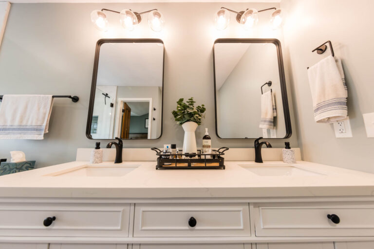 Bathroom Remodel in Columbus, Ohio With double mirrors and quartz countertop vanity.