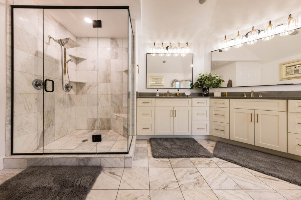 Dublin Bathroom with tiled walk in shower and double sink cabinets