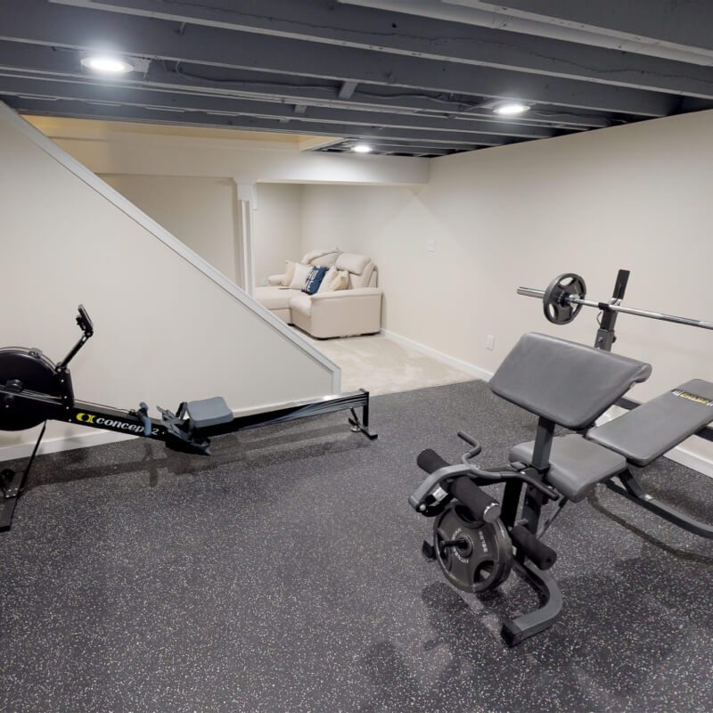 basement living and exercise area